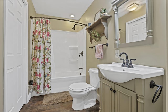 18738 State Route 327, Laurelville, OH 43135 - bathroom featuring vanity, wood finished floors, toilet, and shower / tub combo