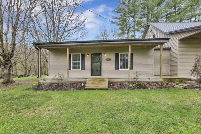 18738 State Route 327, Laurelville, OH 43135 - view of front of home with a front yard and a porch