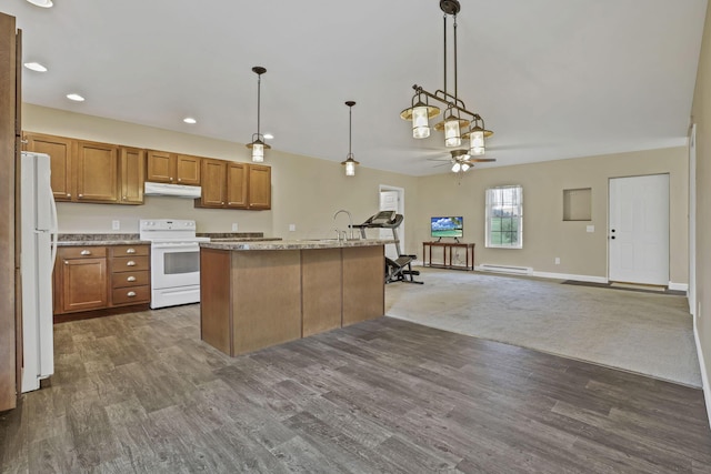 18738 State Route 327, Laurelville, OH 43135 - kitchen featuring a ceiling fan, brown cabinets, open floor plan, under cabinet range hood, and white appliances