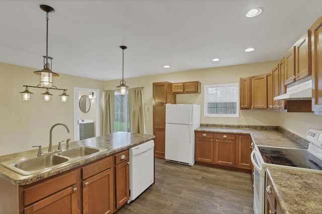 18738 State Route 327, Laurelville, OH 43135 - kitchen with a sink, under cabinet range hood, white appliances, recessed lighting, and dark wood-style flooring