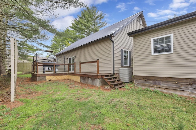 18738 State Route 327, Laurelville, OH 43135 - back of house with a lawn, fence, and a deck