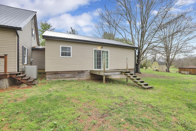 18738 State Route 327, Laurelville, OH 43135 - back of house featuring metal roof, a deck, and a yard