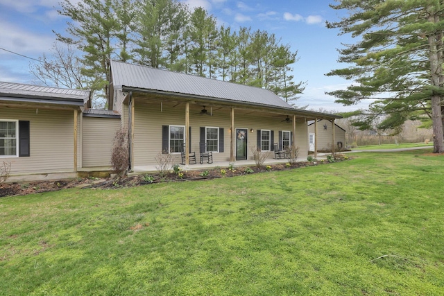 18738 State Route 327, Laurelville, OH 43135 - back of house featuring a lawn, metal roof, and ceiling fan