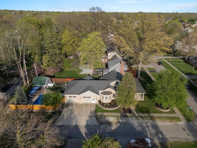 aerial view with a wooded view