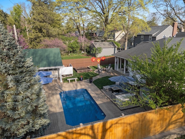 view of pool with a patio, a fenced in pool, and a fenced backyard