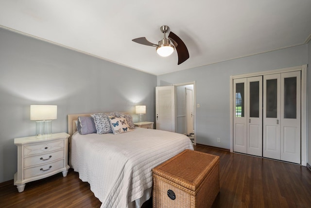 bedroom with baseboards, ceiling fan, wood finished floors, and a closet