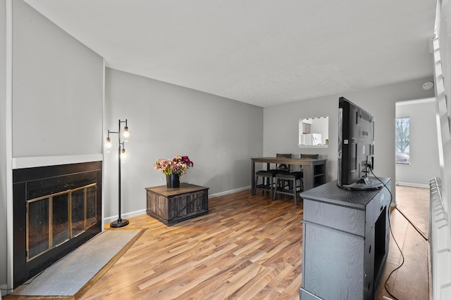 3018 Cooper Bluff Dr, Columbus, OH 43231 - living area with baseboards and light wood finished floors