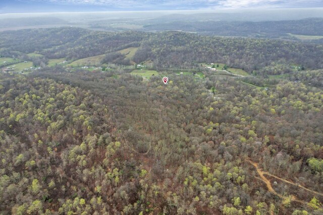 1335 Mingo Rd, Chillicothe, OH 45601 - aerial view of property and surrounding area featuring a heavily wooded area