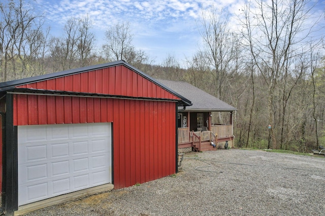 1335 Mingo Rd, Chillicothe, OH 45601 - garage featuring a porch