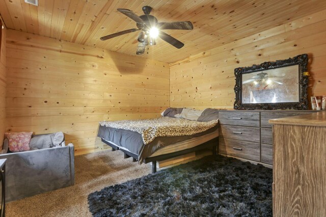 1335 Mingo Rd, Chillicothe, OH 45601 - bedroom featuring wooden walls, carpet flooring, wood ceiling, and a ceiling fan