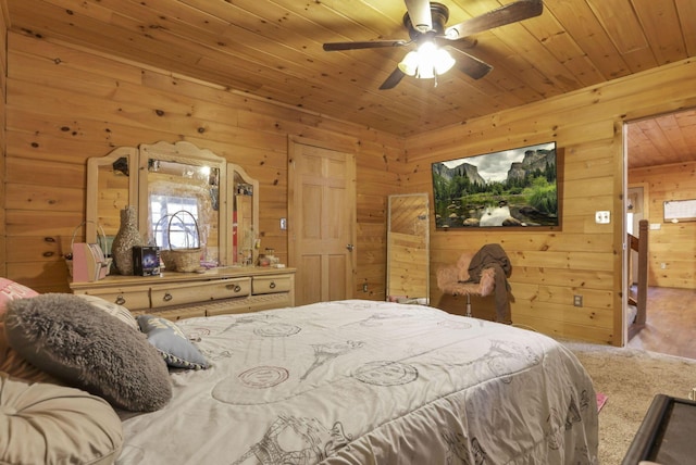 1335 Mingo Rd, Chillicothe, OH 45601 - carpeted bedroom with wooden walls, wooden ceiling, and ceiling fan