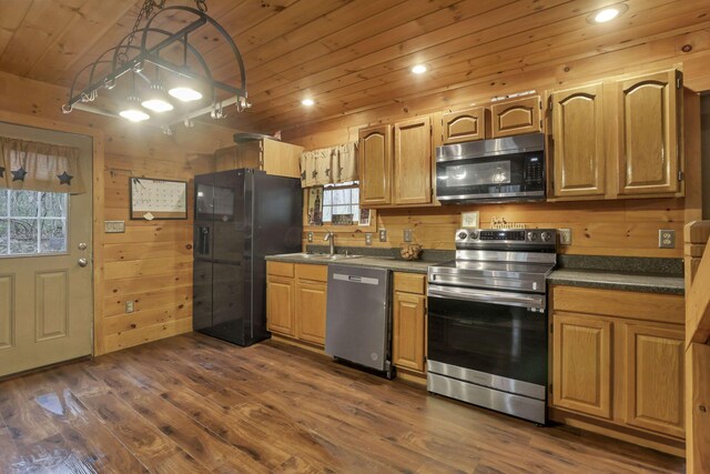 1335 Mingo Rd, Chillicothe, OH 45601 - kitchen with appliances with stainless steel finishes, wooden ceiling, dark countertops, plenty of natural light, and dark wood-style flooring
