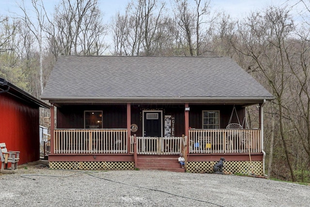 1335 Mingo Rd, Chillicothe, OH 45601 - rustic home with a porch and a shingled roof