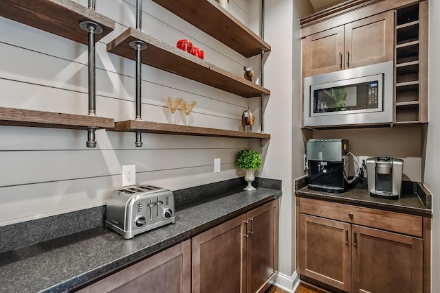 11061 Kingfisher Pl, Plain City, OH 43064 - kitchen featuring a toaster, stainless steel microwave, and open shelves