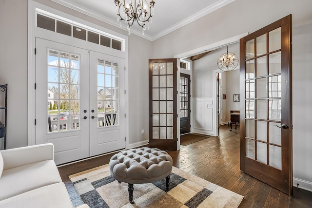 11061 Kingfisher Pl, Plain City, OH 43064 - interior space with french doors, a notable chandelier, ornamental molding, and wood-type flooring