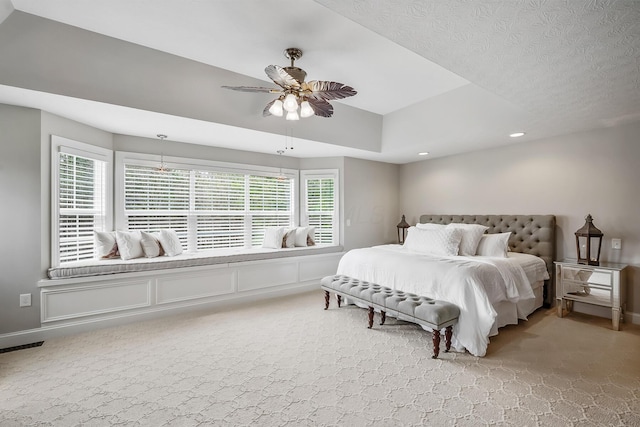 11061 Kingfisher Pl, Plain City, OH 43064 - bedroom featuring ceiling fan, visible vents, multiple windows, and light colored carpet