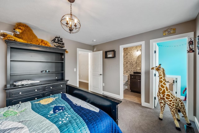 11061 Kingfisher Pl, Plain City, OH 43064 - bedroom with carpet floors, a notable chandelier, baseboards, and ensuite bath