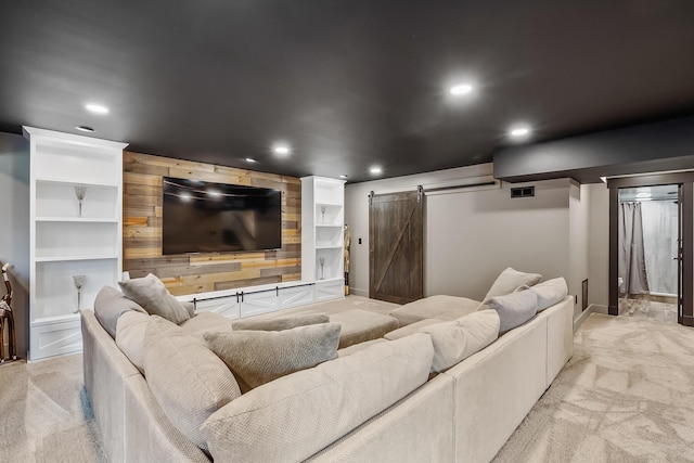 11061 Kingfisher Pl, Plain City, OH 43064 - cinema with wood walls, light colored carpet, recessed lighting, a barn door, and visible vents