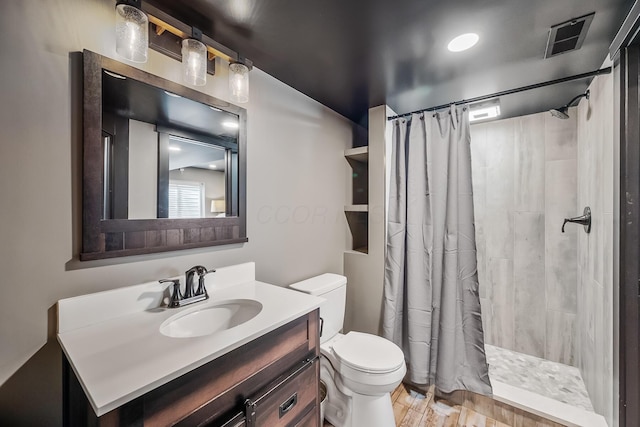 11061 Kingfisher Pl, Plain City, OH 43064 - full bath featuring toilet, vanity, a tile shower, and visible vents