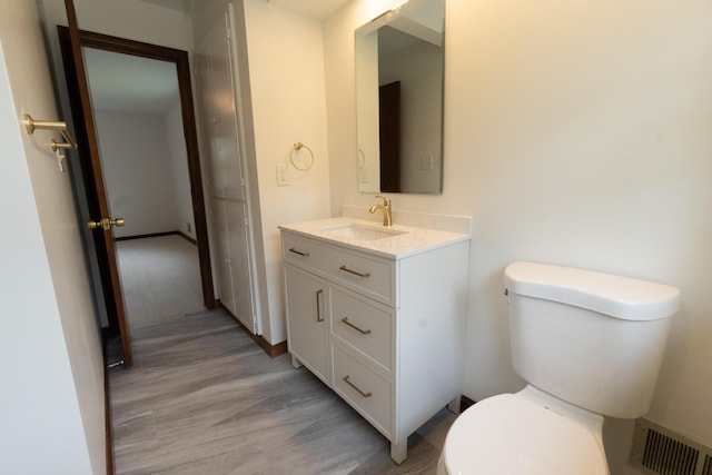 3161 Avalon Rd, Upper Arlington, OH 43221 - half bath featuring vanity and wood finished floors