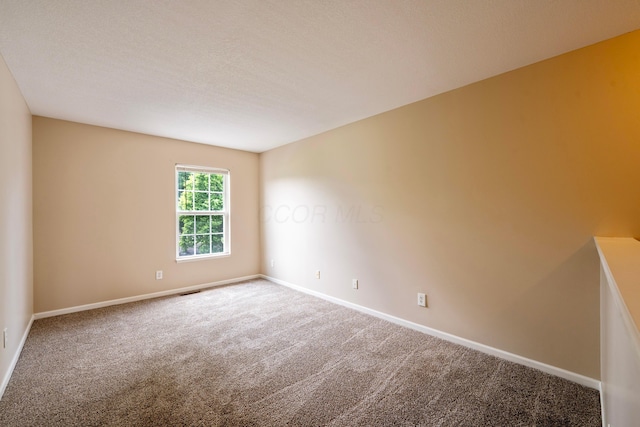 1218 Green Dr Unit 604, Columbus, OH 43230 - carpeted empty room with baseboards