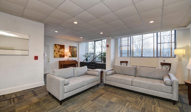 1620 E Broad St Unit 608, Columbus, OH 43203 - living room with recessed lighting, a paneled ceiling, baseboards, and dark carpet