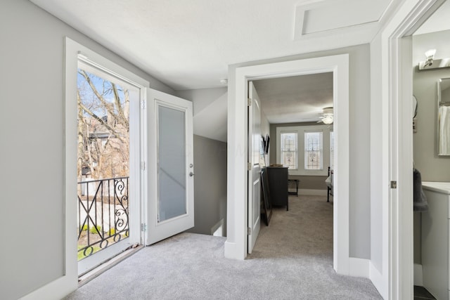 72 Miami Ave, Columbus, OH 43203 - hallway with baseboards, an upstairs landing, carpet, and attic access