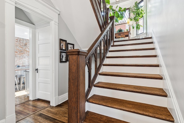 72 Miami Ave, Columbus, OH 43203 - staircase featuring baseboards and wood finished floors