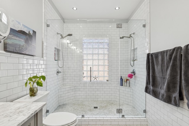 72 Miami Ave, Columbus, OH 43203 - full bath with vanity, tile walls, recessed lighting, toilet, and a stall shower