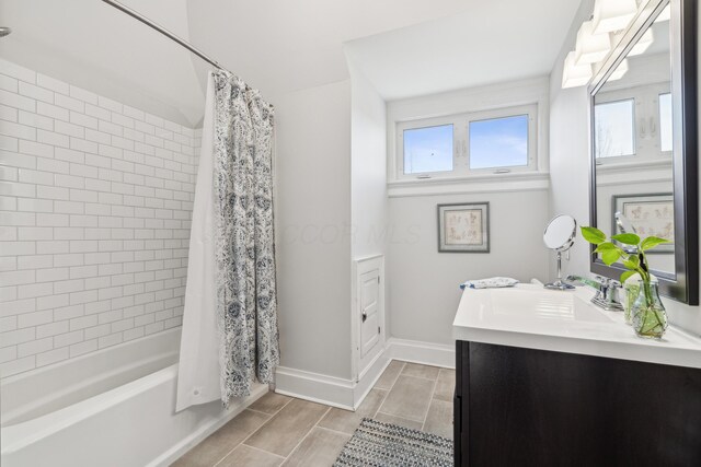 72 Miami Ave, Columbus, OH 43203 - full bath featuring wood tiled floor, plenty of natural light, baseboards, and vanity