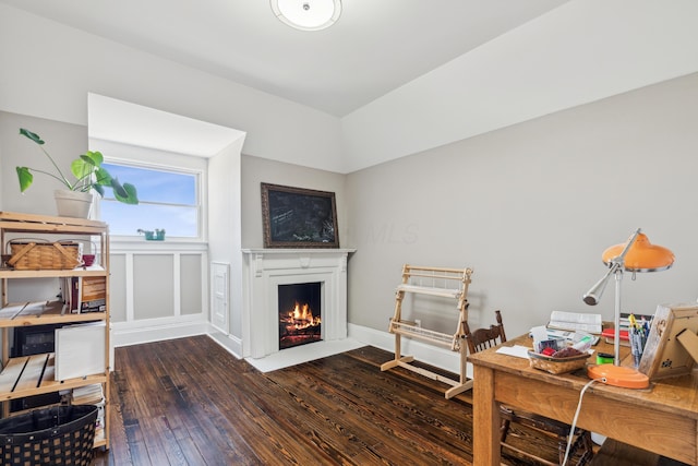 72 Miami Ave, Columbus, OH 43203 - home office with wood-type flooring and a warm lit fireplace