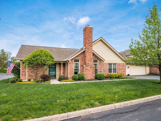single story home with an attached garage, driveway, a front lawn, and brick siding