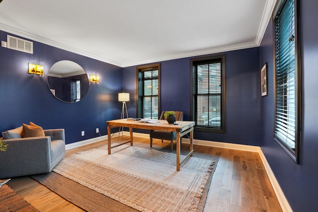 324 Jackson St, Columbus, OH 43206 - office featuring wood finished floors, ornamental molding, baseboards, and visible vents