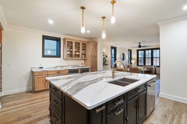 324 Jackson St, Columbus, OH 43206 - kitchen with a ceiling fan, light wood-style flooring, a sink, and crown molding