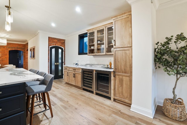 324 Jackson St, Columbus, OH 43206 - kitchen featuring light wood finished floors and beverage cooler