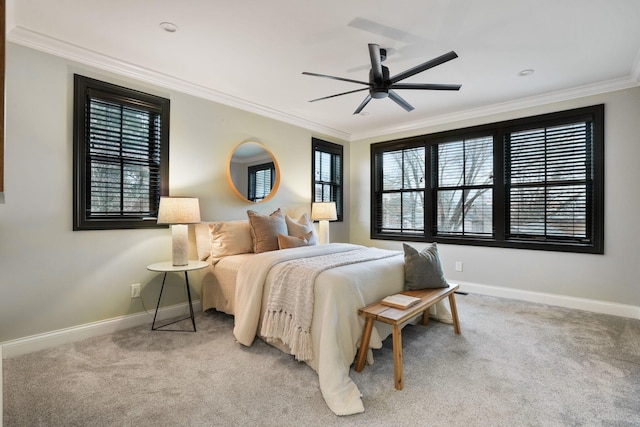 324 Jackson St, Columbus, OH 43206 - bedroom with baseboards, ornamental molding, and light colored carpet