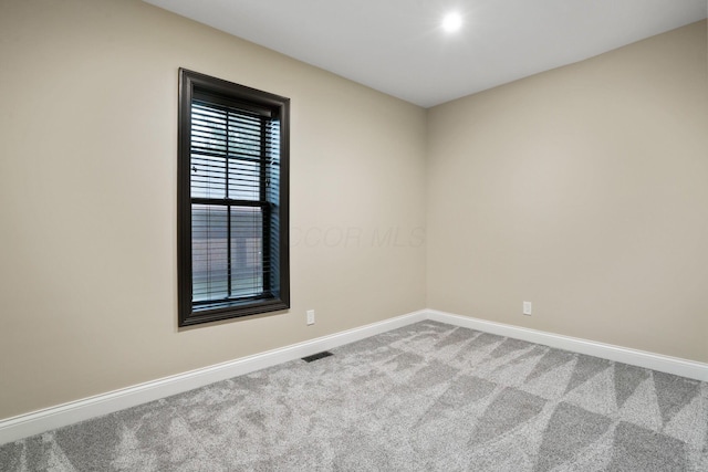 324 Jackson St, Columbus, OH 43206 - empty room featuring carpet floors, baseboards, and visible vents