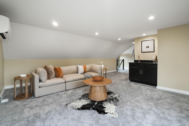 324 Jackson St, Columbus, OH 43206 - living area featuring light colored carpet, vaulted ceiling, indoor wet bar, and baseboards