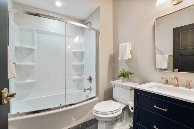 324 Jackson St, Columbus, OH 43206 - bathroom with toilet, tile patterned floors, vanity, and enclosed tub / shower combo