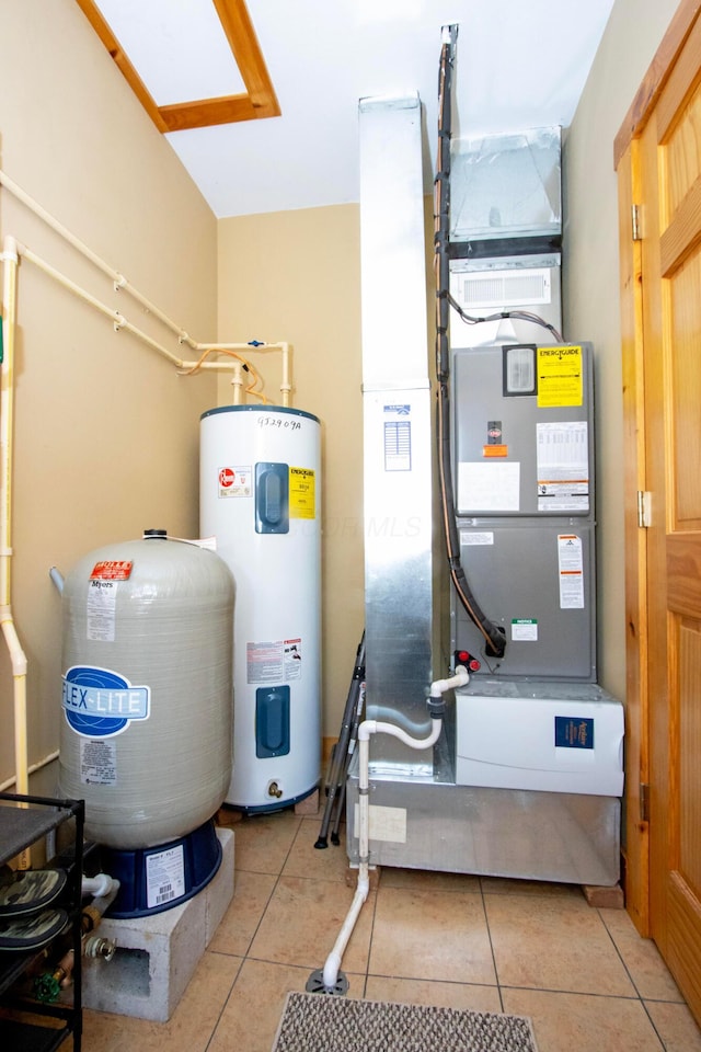 utility room featuring water heater
