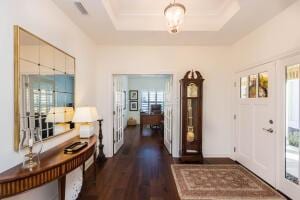 5165 Bluffton Way, Delaware, OH 43015 - entryway featuring a raised ceiling, dark wood-style floors, and visible vents
