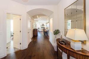 5165 Bluffton Way, Delaware, OH 43015 - hallway with arched walkways and wood finished floors