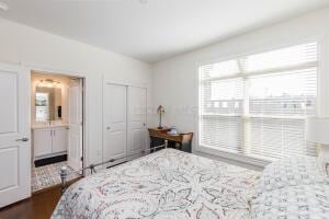 5165 Bluffton Way, Delaware, OH 43015 - bedroom featuring a closet and dark wood-style flooring