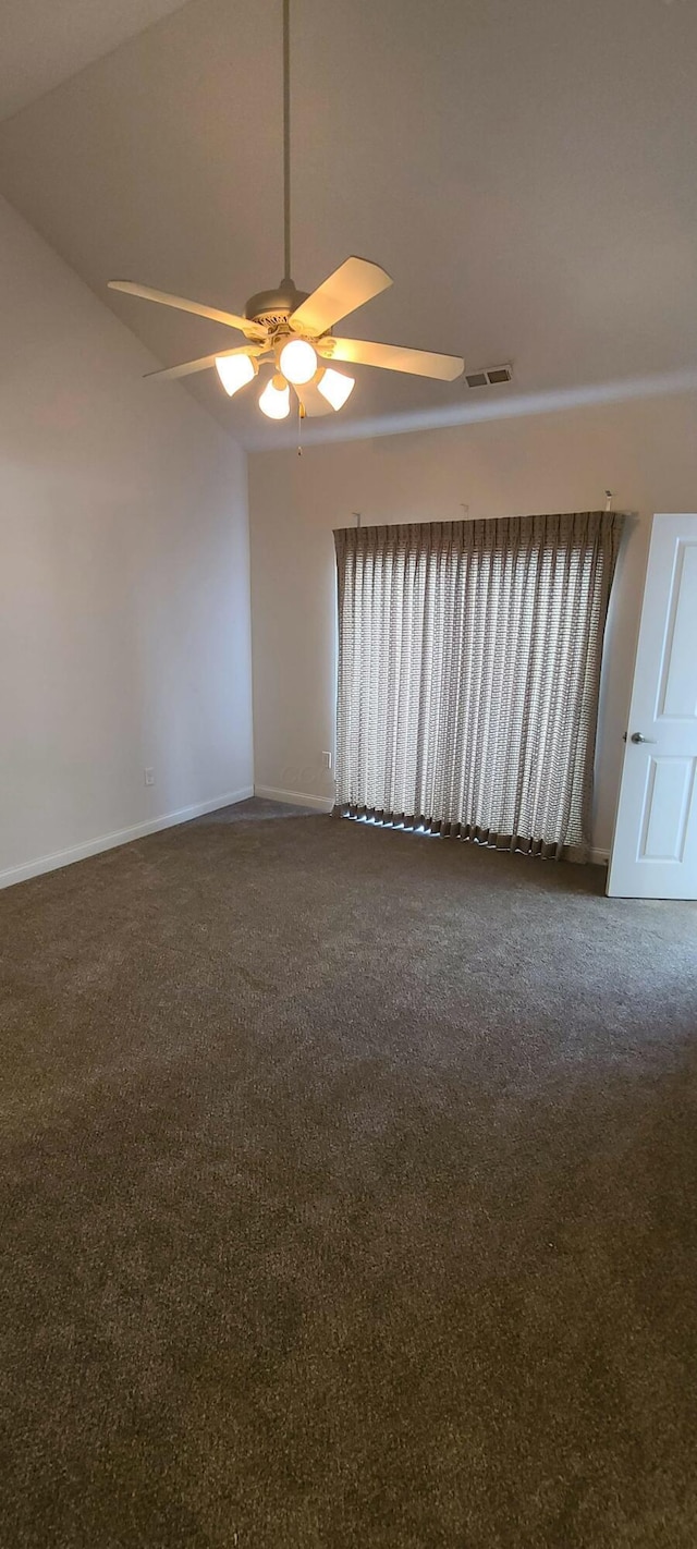 unfurnished room with baseboards, visible vents, lofted ceiling, ceiling fan, and carpet floors