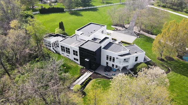 birds eye view of property with a rural view