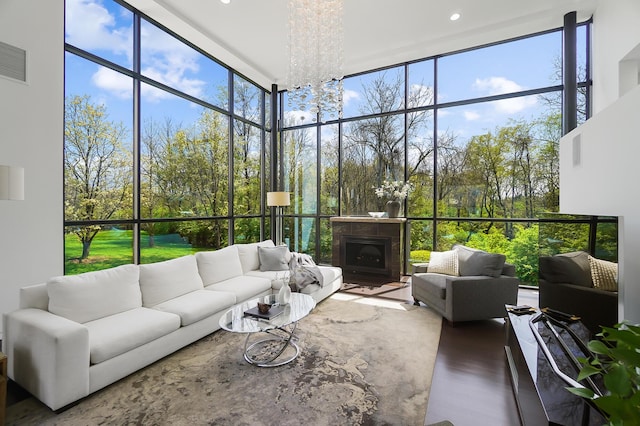 sunroom with a wealth of natural light and visible vents