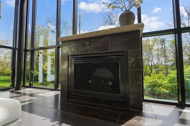 interior details with a tiled fireplace
