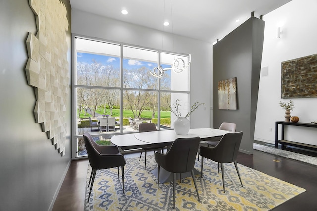 dining room with baseboards and recessed lighting