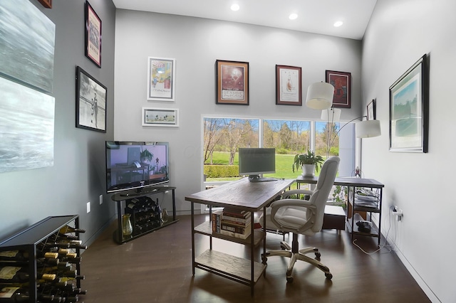 office space featuring recessed lighting, wood finished floors, and baseboards