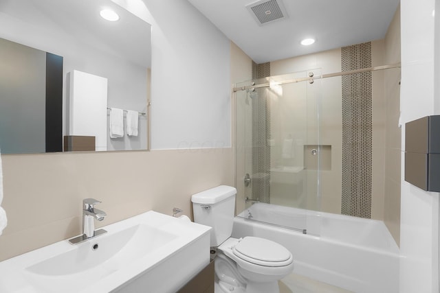full bath featuring recessed lighting, enclosed tub / shower combo, visible vents, toilet, and vanity